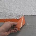 Blue Dolphin outdoor plaster masking tape removal after plastering – clean edge and residue-free finish