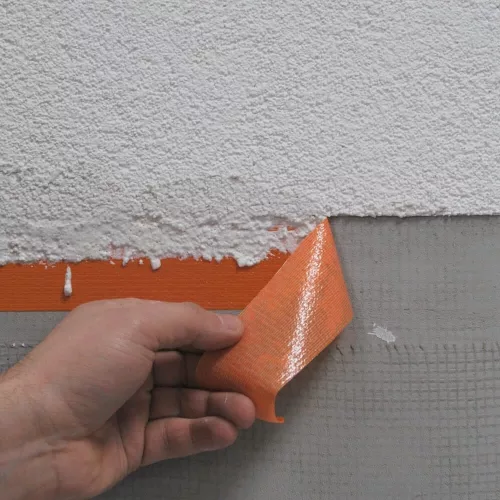 Blue Dolphin outdoor plaster masking tape removal after plastering – clean edge and residue-free finish