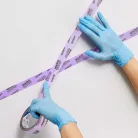 Blue Dolphin WASHI Sensitive purple painter’s masking tape applied during painting – precise masking for delicate surfaces with clean, residue-free removal